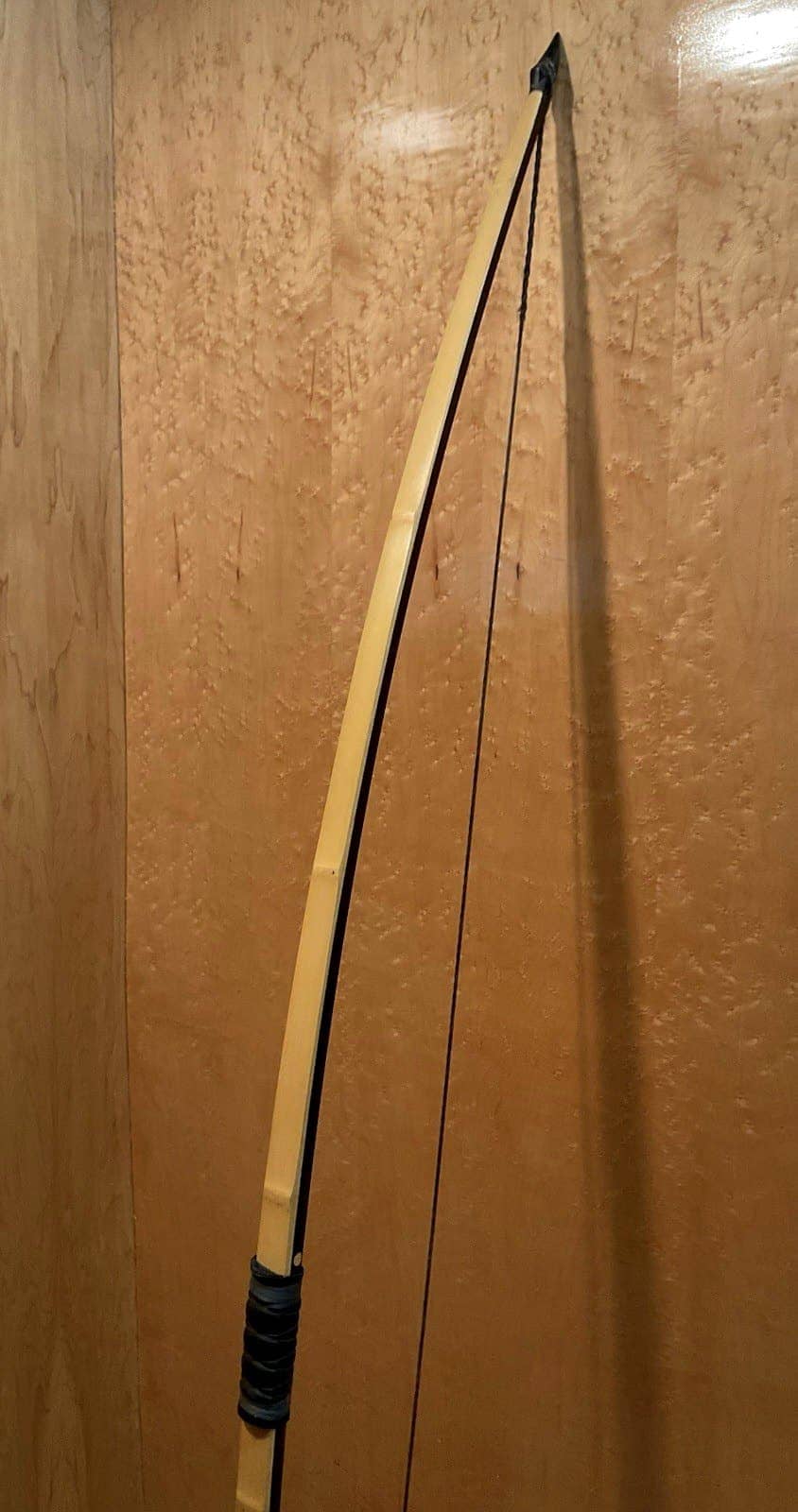 The 115-pound bamboo-backed ipe warbow, standing, the bamboo back and dark ipe belly in view