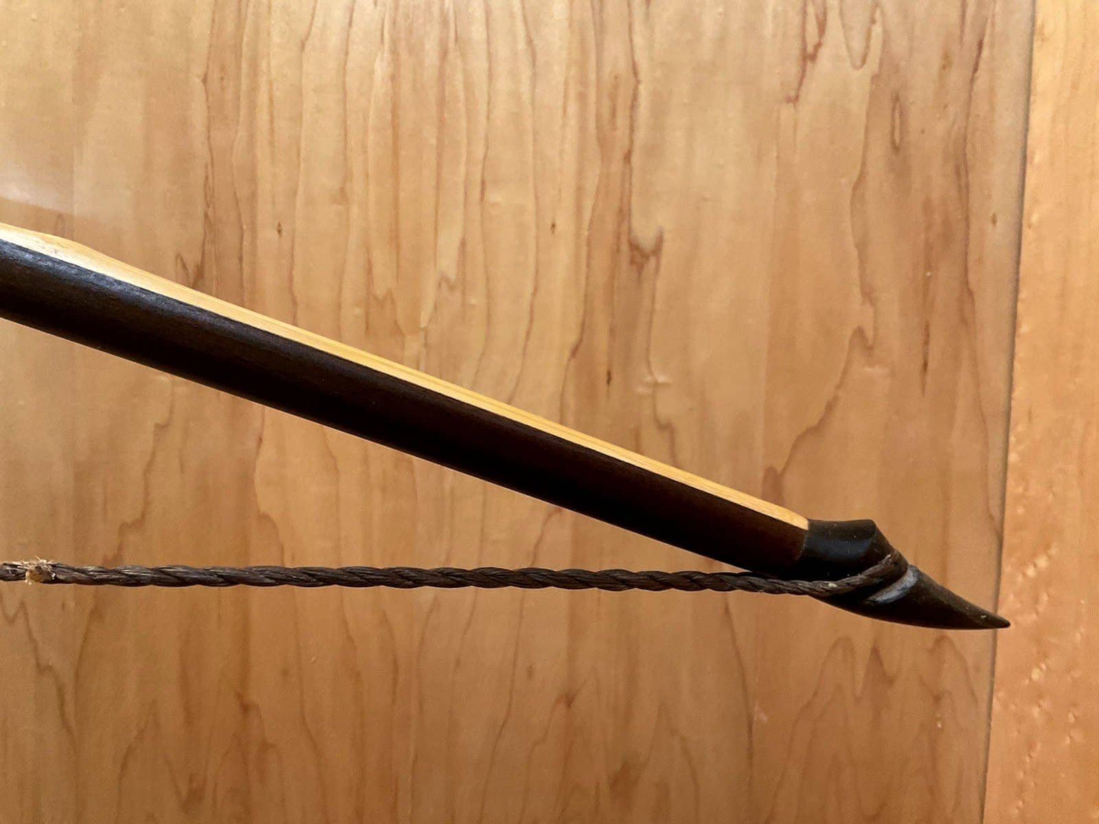 The right buffalo horn tip of the 150-pound bamboo-backed ipe warbow, with its twisted string