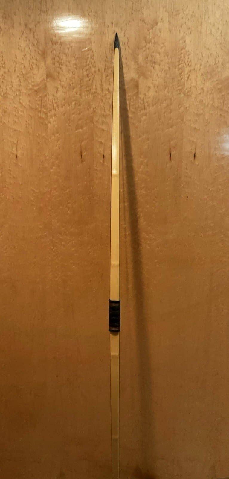 The 150-pound bamboo-backed ipe warbow, standing, seen from its bamboo back