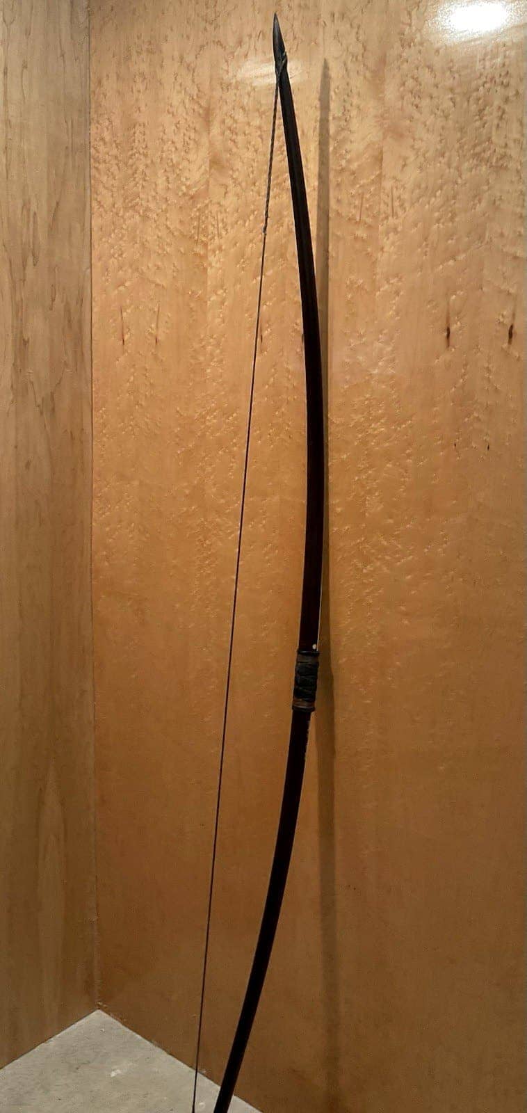 The 150-pound bamboo-backed ipe warbow, standing, seen from the side