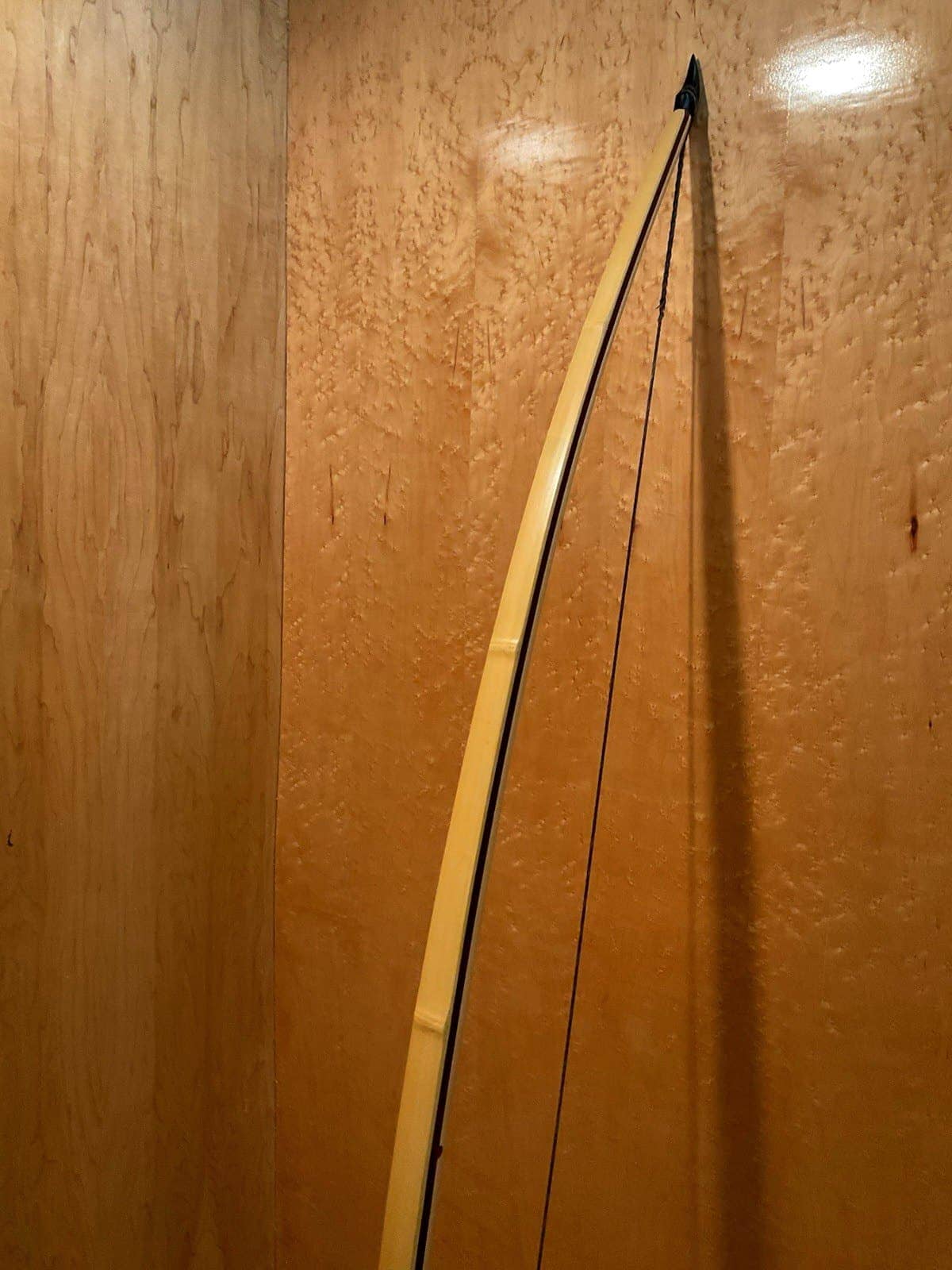 The 180-pound bamboo-backed tri-lam warbow, standing, the bamboo back and ipe core in view