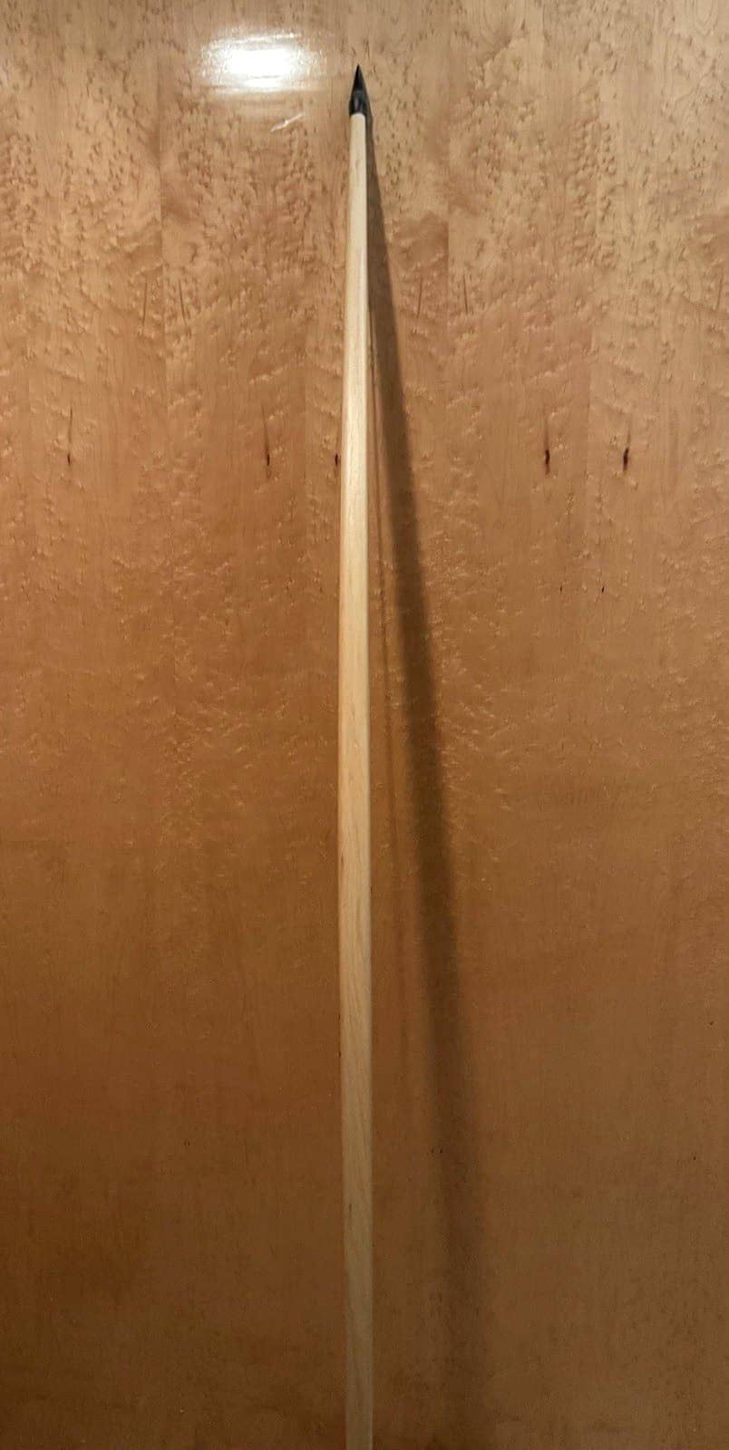 The 190-pound white hickory selfbow warbow, standing, seen from its back